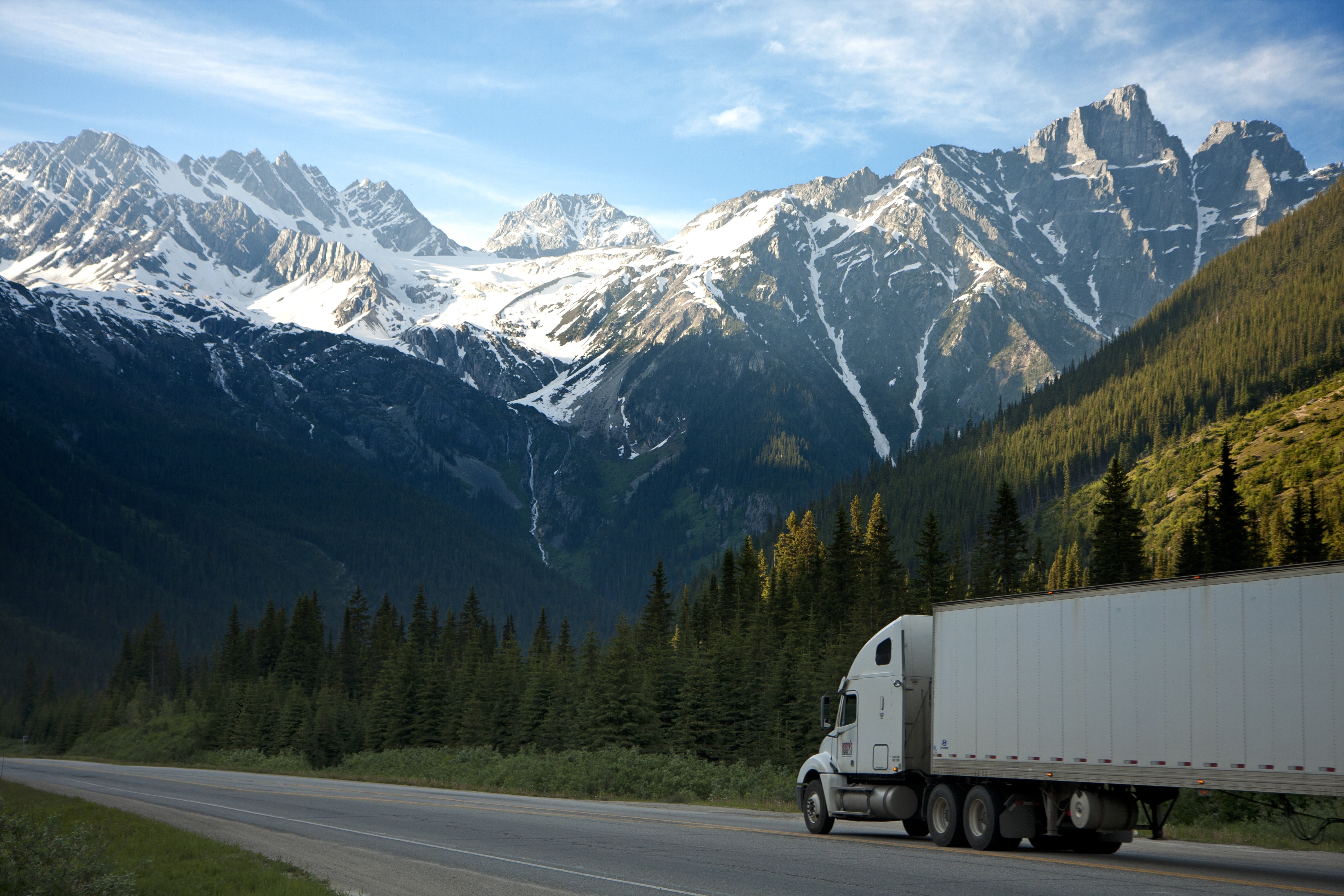 Semi trucking through the mountains